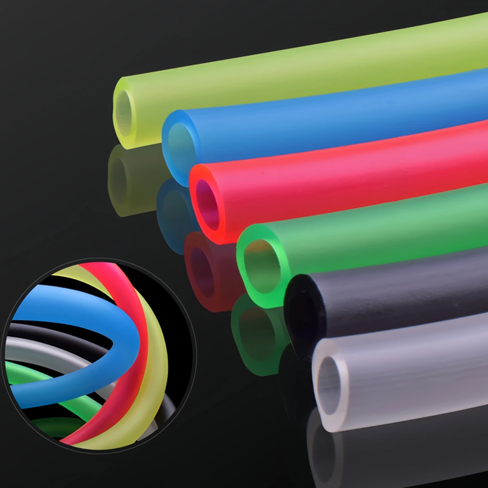 PVC aquarium airline tubing in six colors, showing open ends and an inset of curved tubing.