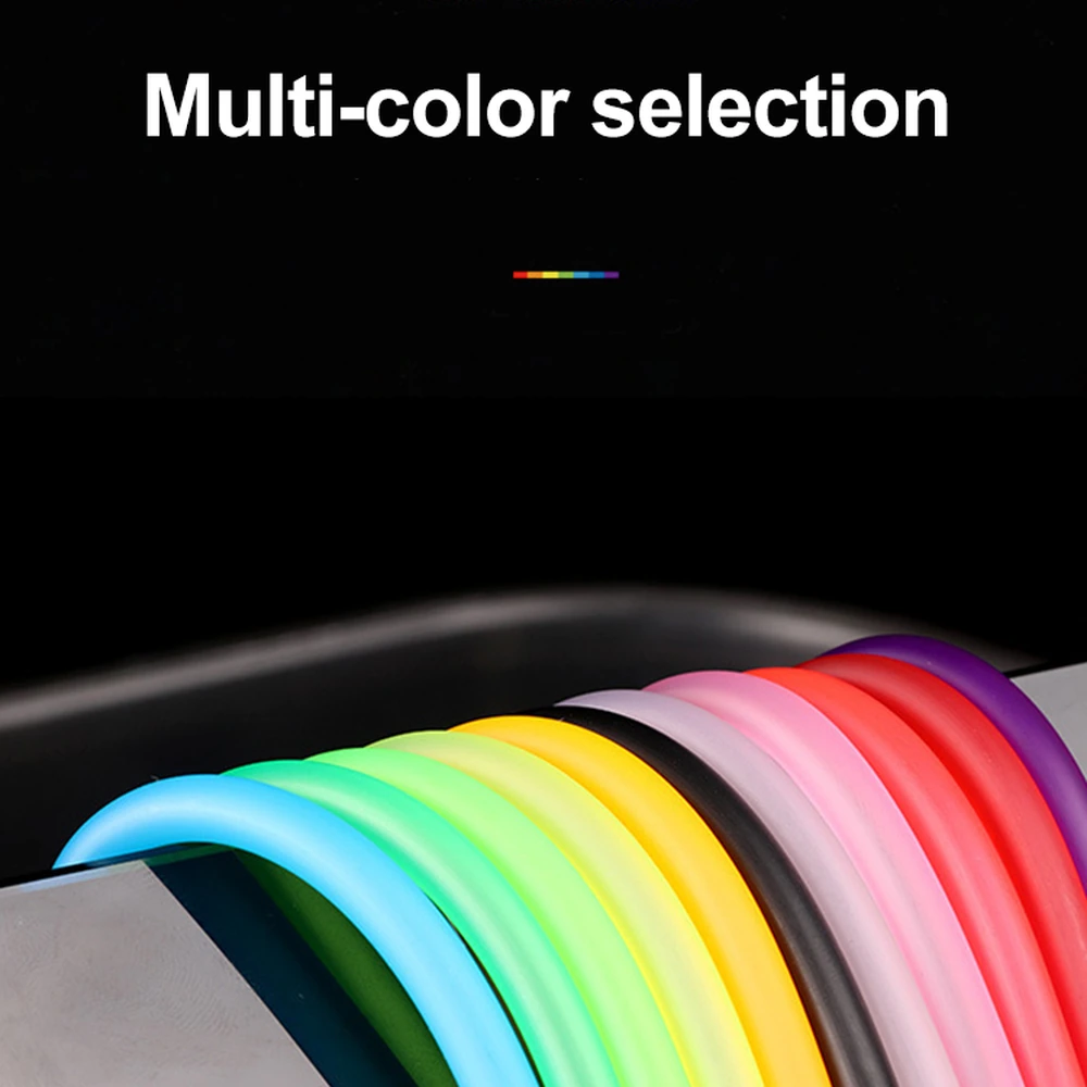 PVC aquarium airline tubing in ten colors draped side by side over an edge.
