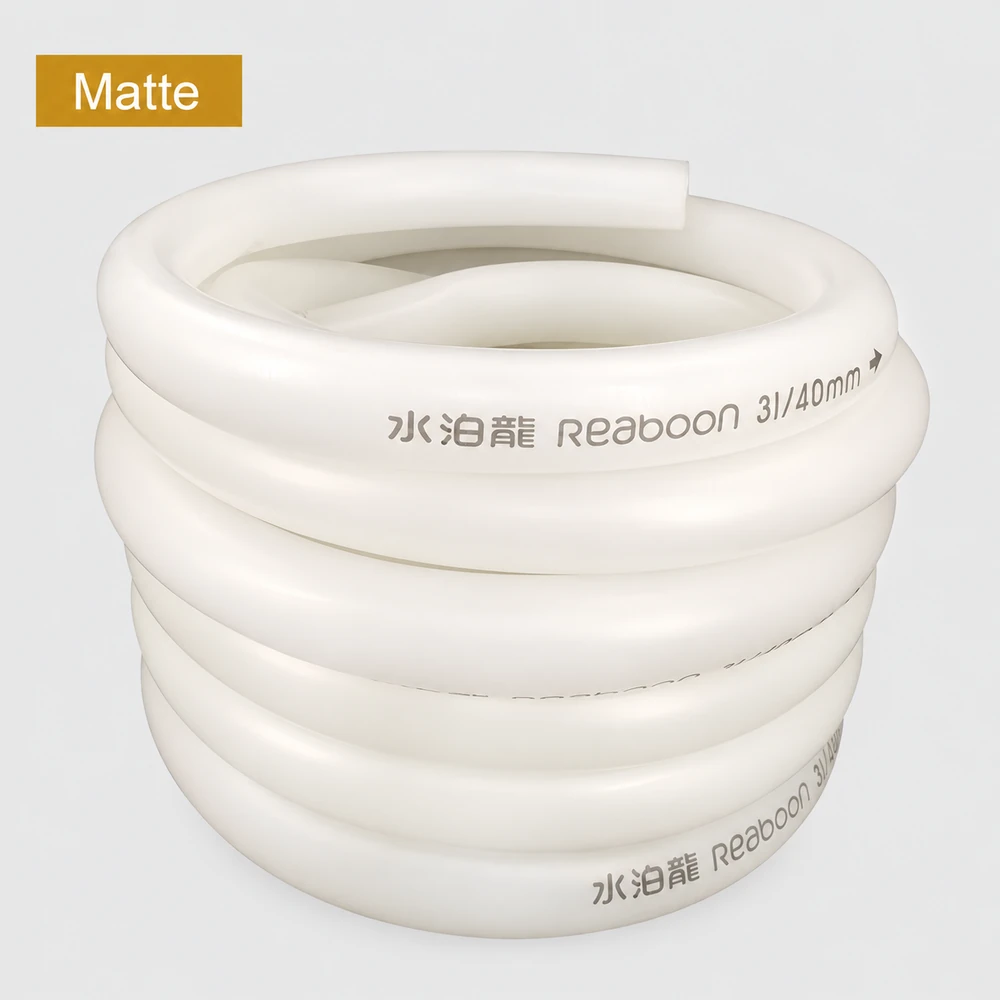 Actual product display of matte PVC aquarium water hose rolls.