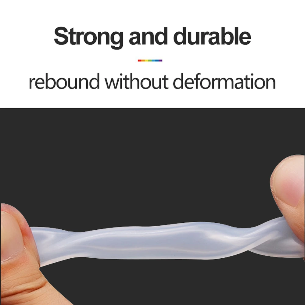 Translucent PVC aquarium airline tubing twisted between two hands to demonstrate elasticity and recovery without permanent deformation.