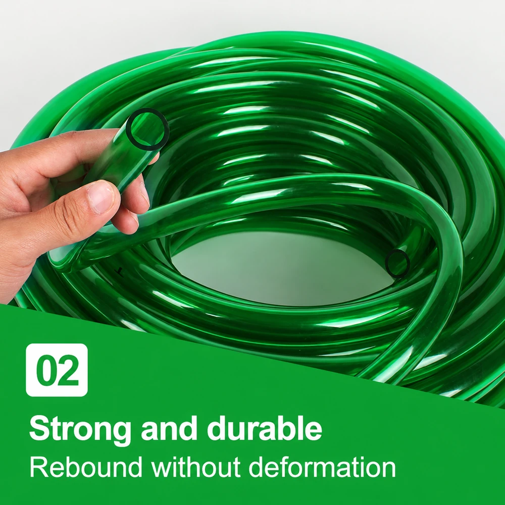 Green PVC aquarium water hose coiled with one end held in a hand, showing its curved shape and open bore.